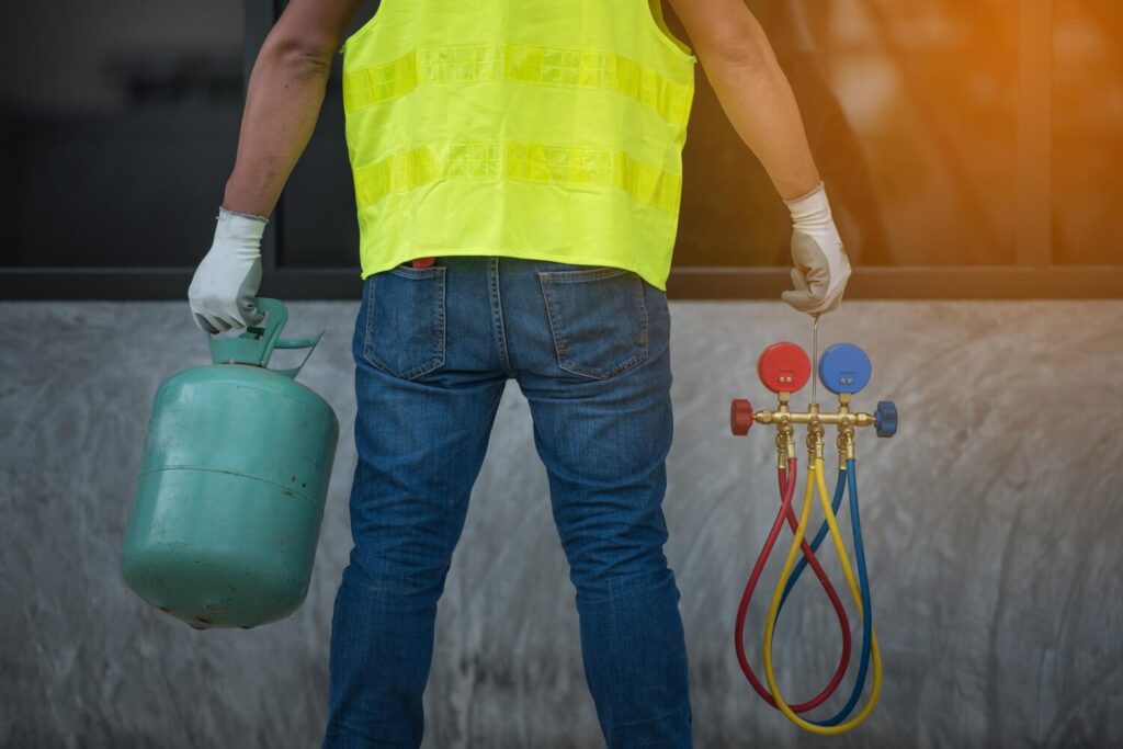 Midsection worker holding manometers 1048944 27282175
